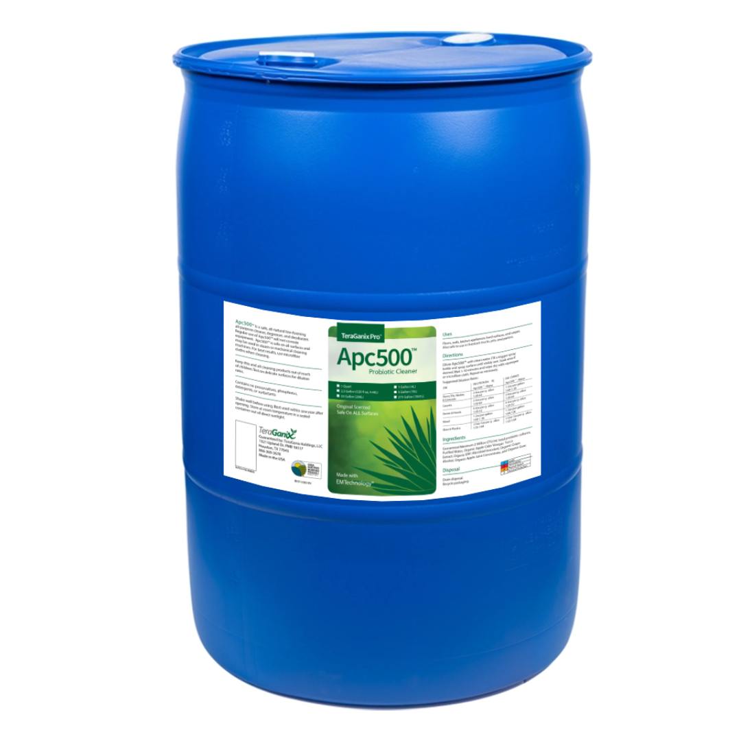 A large blue plastic drum labeled "APC500 Nontoxic All-purpose Cleaning product" by Teraganix Wholesale, designed for storing and transporting multipurpose cleaner concentrate or industrial chemicals.