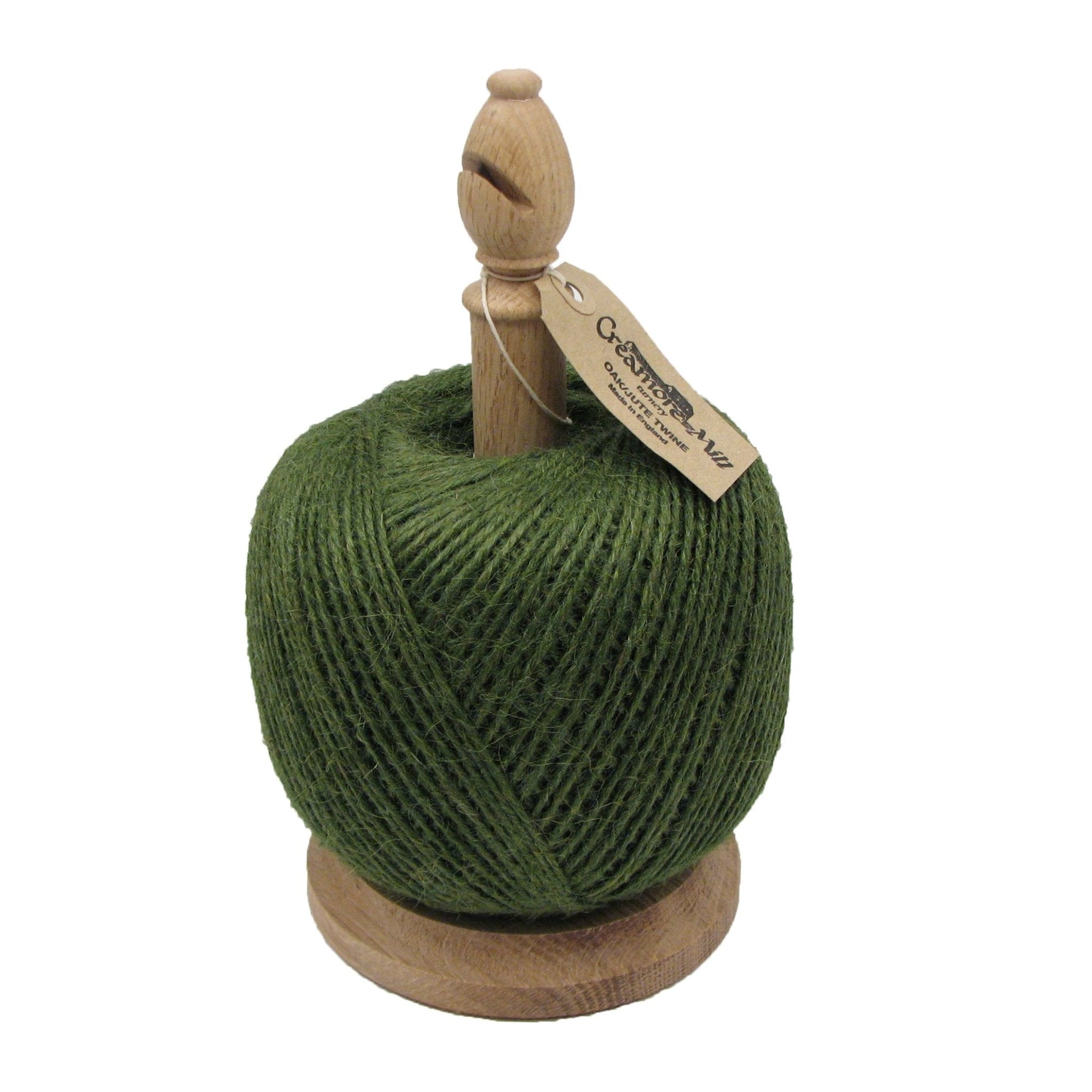 The Celtic Farm Oak Bishop Twine Tidy with Cutter and natural baker's twine, made in Britain, displayed with twine spool and cutter.