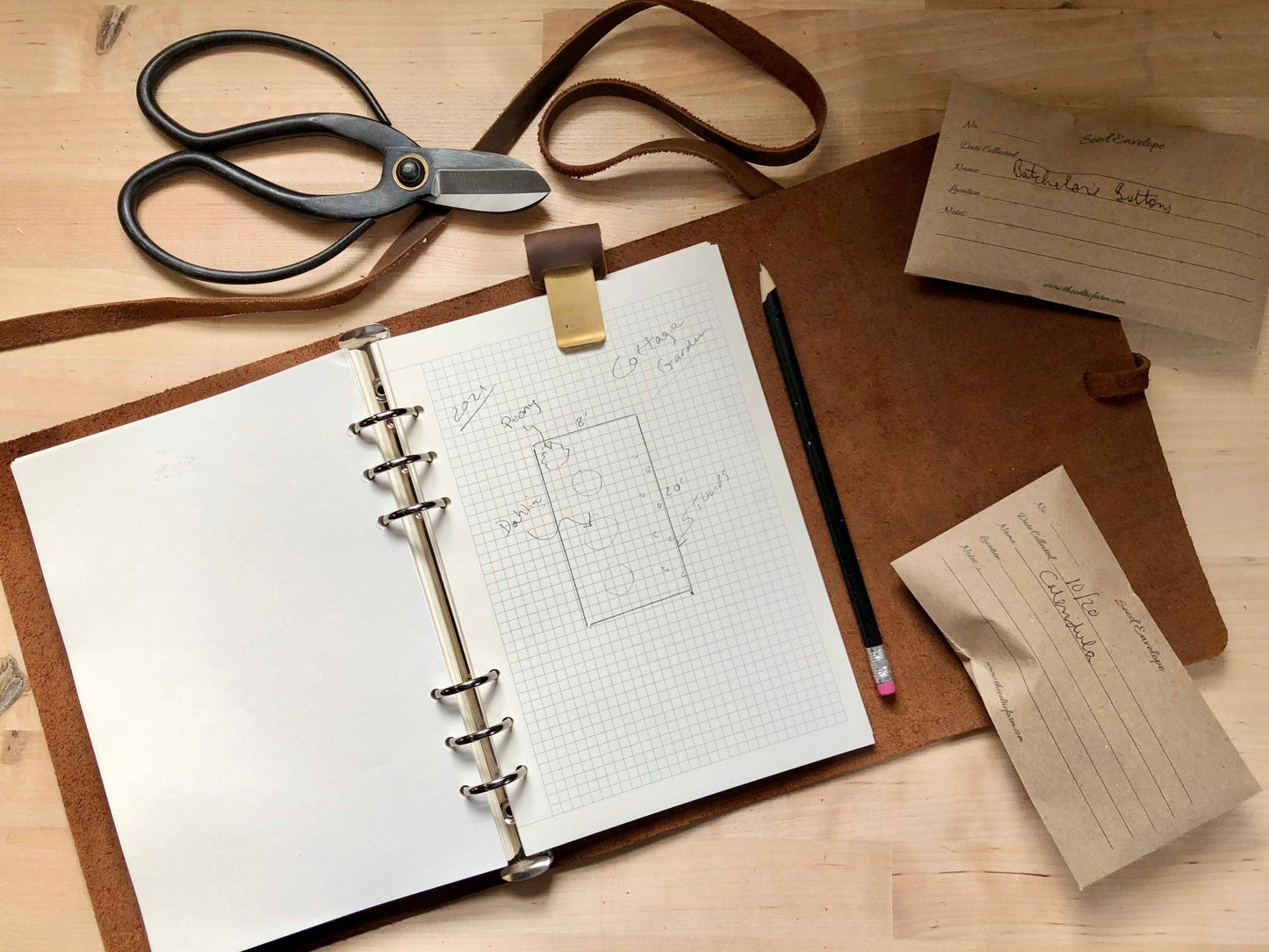 Leather garden journal by The Celtic Farm featuring a durable cover, ideal for garden planning, notes, and design ideas.