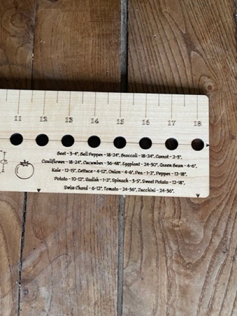 The Celtic Farm’s American Hardwood Seed and Bed Ruler, made in the US from American lumber, features inch markings, seed planting hole guides, and a vegetable spacing chart—perfect for precise gardening.