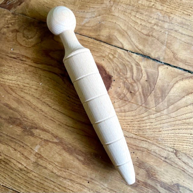 The Celtic Farm’s Garden Dibber (Dibble) for Seeds, imported from Britain, features a rounded handle and ridged body—perfect for efficient seeding and ready to use on your garden bed.