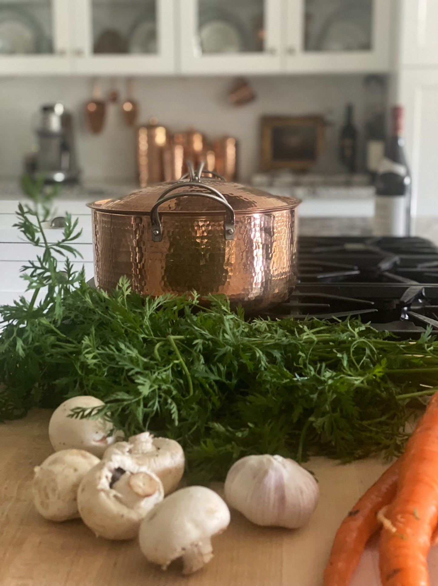 Large copper Dutch oven by Sertodo, showcasing a polished, handcrafted pot perfect for cooking and serving in a stylish kitchen.
