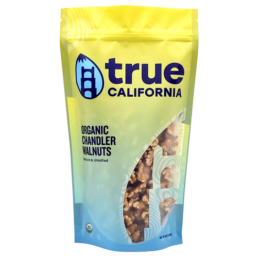 Organic Chandler Walnuts by True California, 1 lb bag showing fresh, shelled walnuts with textured brown shells.