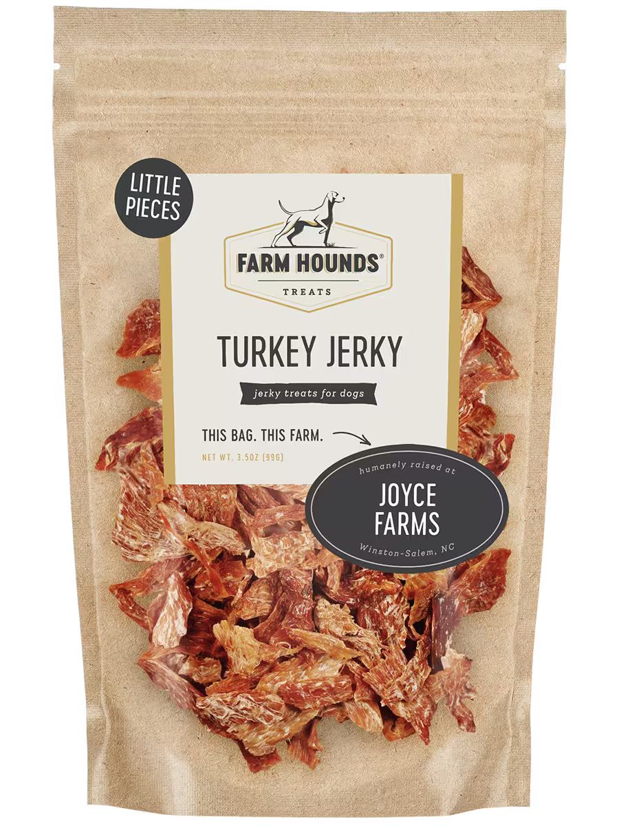 Front view of Farm Hounds turkey jerky pieces, showcasing the small, dried turkey meat slices in a natural, appetizing arrangement.