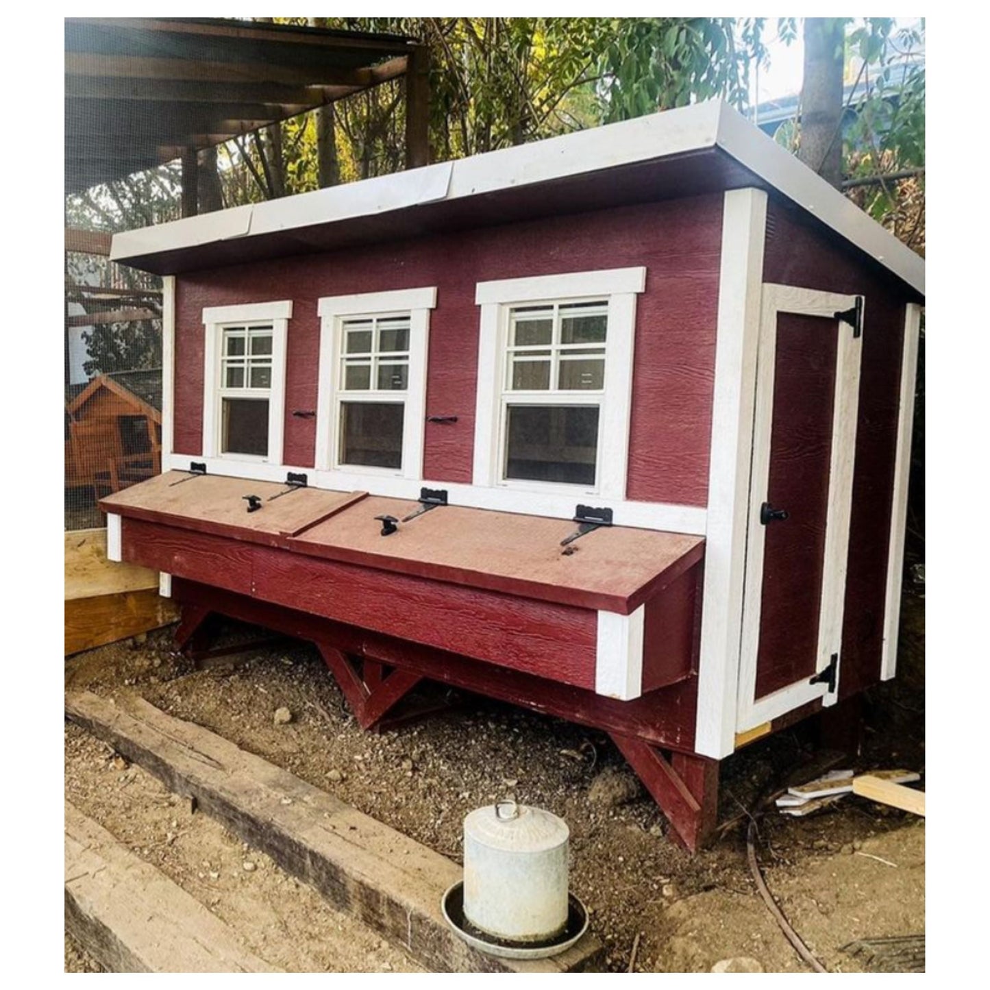 OverEZ XL chicken coop with spacious design for up to 20 chickens, featuring a sturdy structure and secure nesting areas.
