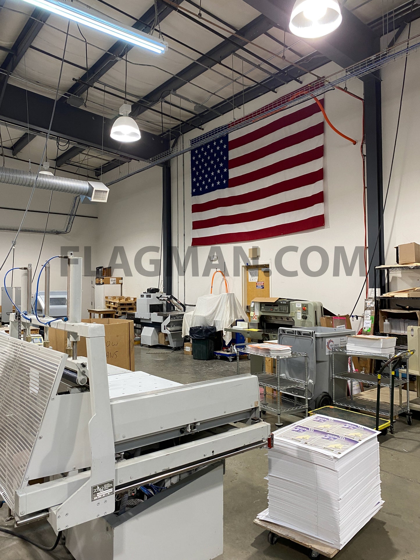 Polyester American flag with reinforced grommets, wall-mounted WallSafe™ flag by Flagman of America, made in the USA.