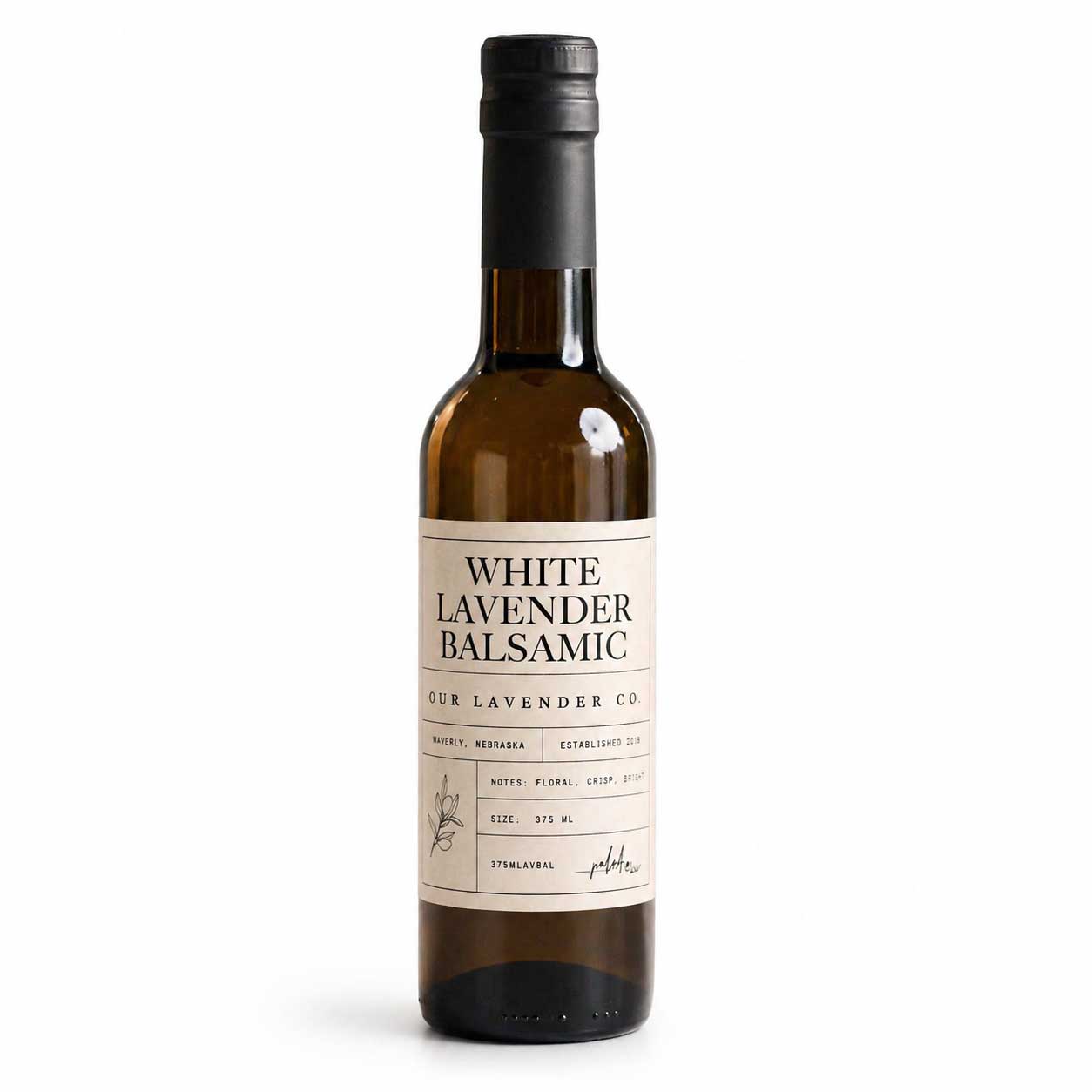 White Lavender Balsamic Vinegar bottle from Our Lavender Co, 12.7 oz, showcasing a clear glass bottle with a white label.