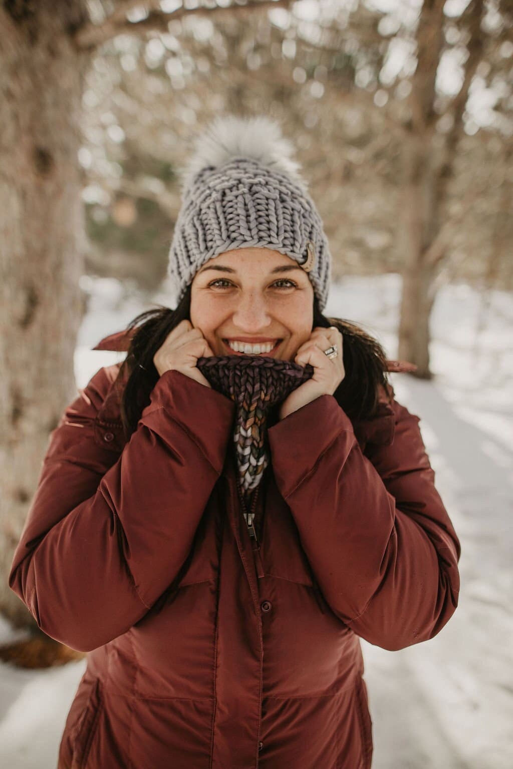 Gray Merino Wool Knit Hat with Faux Fur Pom Pom by Woolly Bear Knits, featuring soft wool and cozy faux fur detail.
