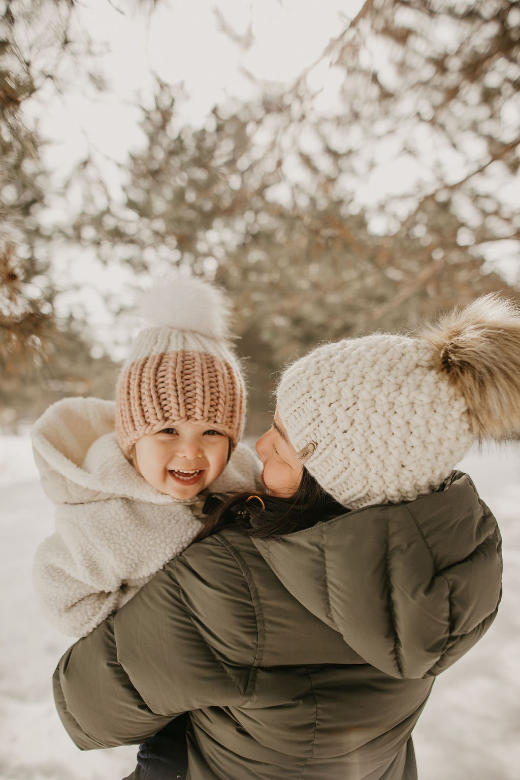 Ivory Peruvian Wool Knit Hat with faux fur pom pom by Woolly Bear Knits, featuring a cozy, textured wool design and fluffy pom accessory.