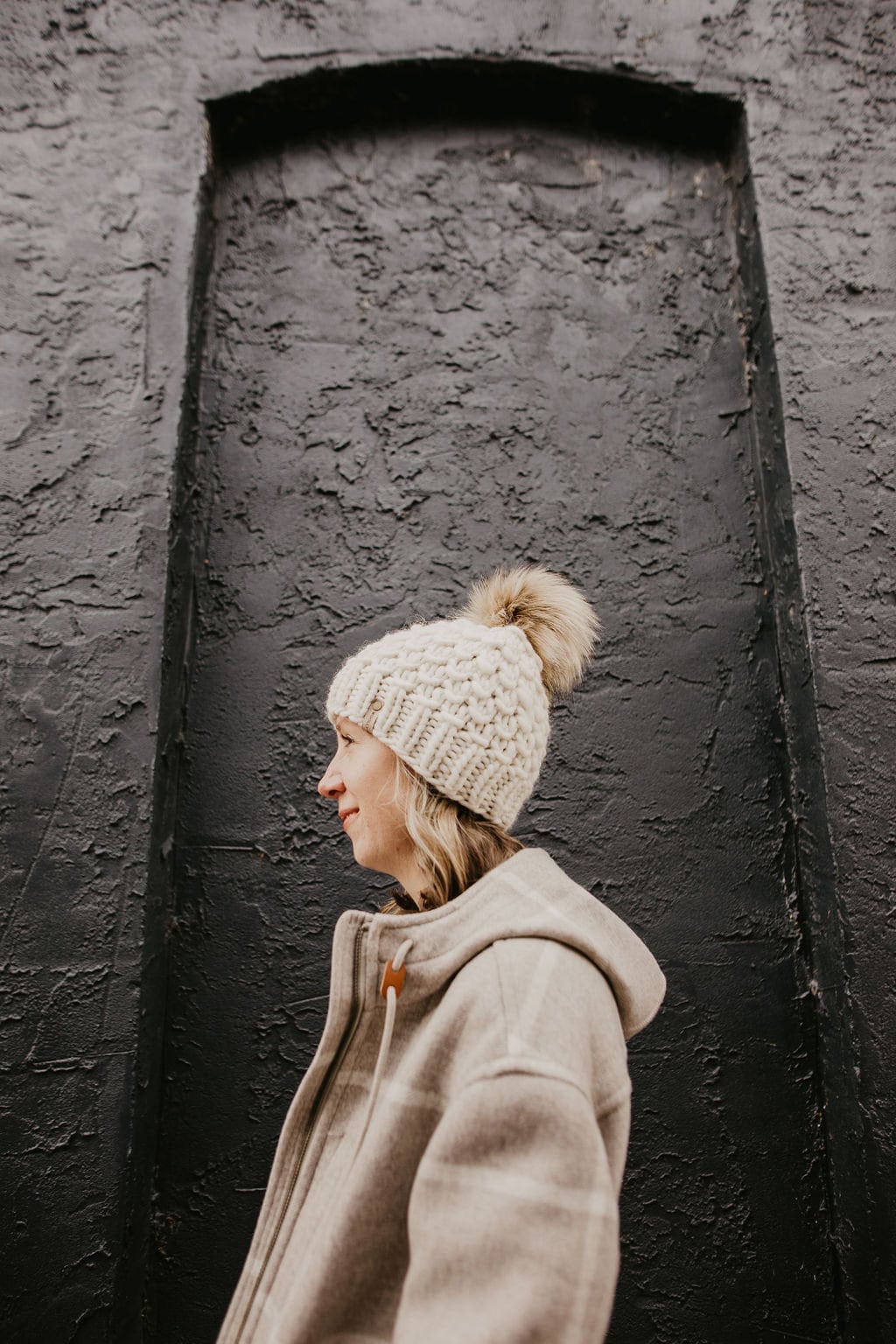 Ivory Peruvian Wool Knit Hat with faux fur pom pom by Woolly Bear Knits, featuring warm Peruvian wool and stylish design.
