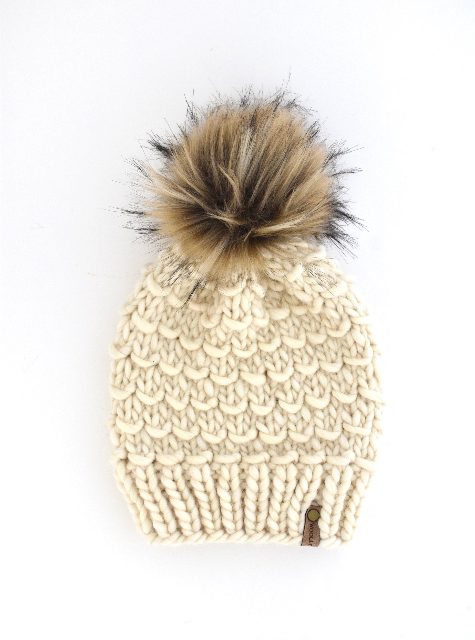 Ivory Peruvian wool knit hat with faux fur pom pom from Woolly Bear Knits, cozy winter accessory with warm Peruvian wool.