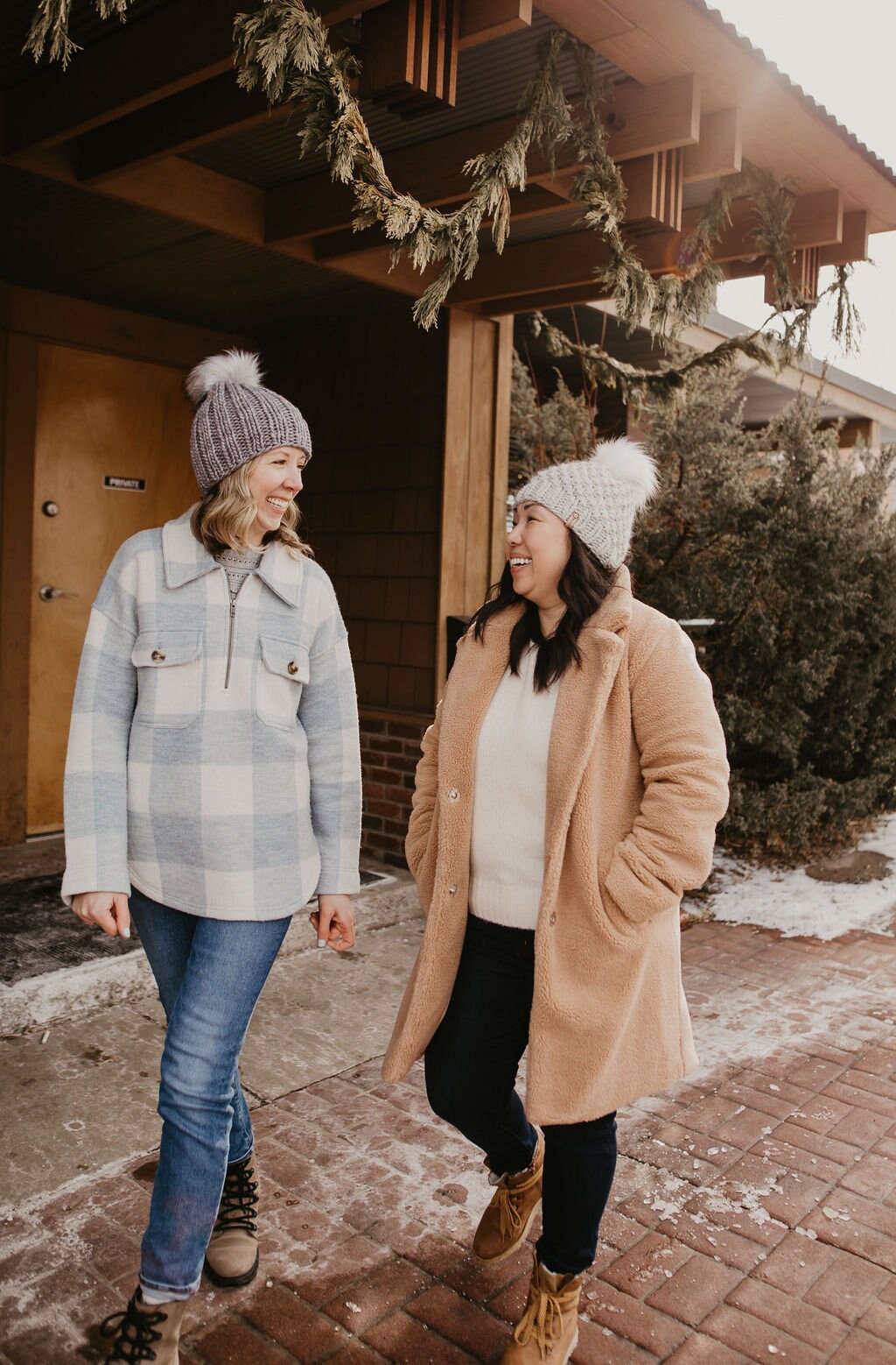 Light gray Peruvian wool knit hat with faux fur pom pom from Woolly Bear Knits, featuring warm, cozy Peruvian wool and stylish design.