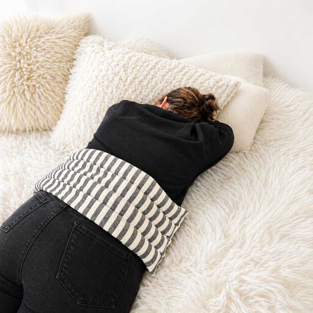 Lavender body wrap heating pad from Our Lavender Co, showing a soft fabric wrap designed for soothing heat therapy.