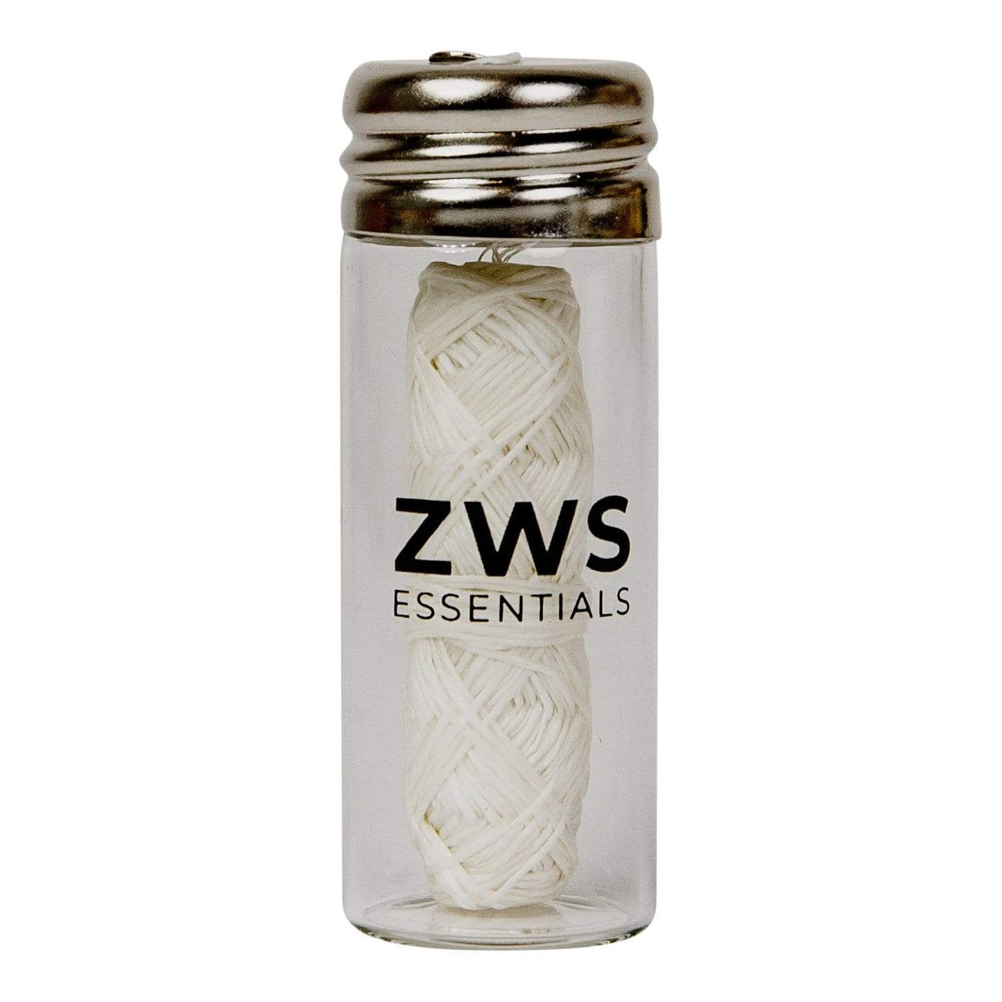 ZeroWasteStore.com Silk Floss is a 30m biodegradable, refillable dental floss in a clear glass container with a metal lid—your plastic-free essential for sustainable oral care.