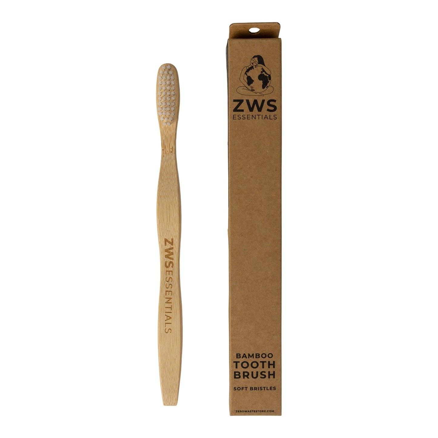 A plastic-free, zero waste Bamboo Toothbrush with soft bristles from ZeroWasteStore.com rests beside its upright brown cardboard box labeled Bamboo Toothbrush Soft Bristles.