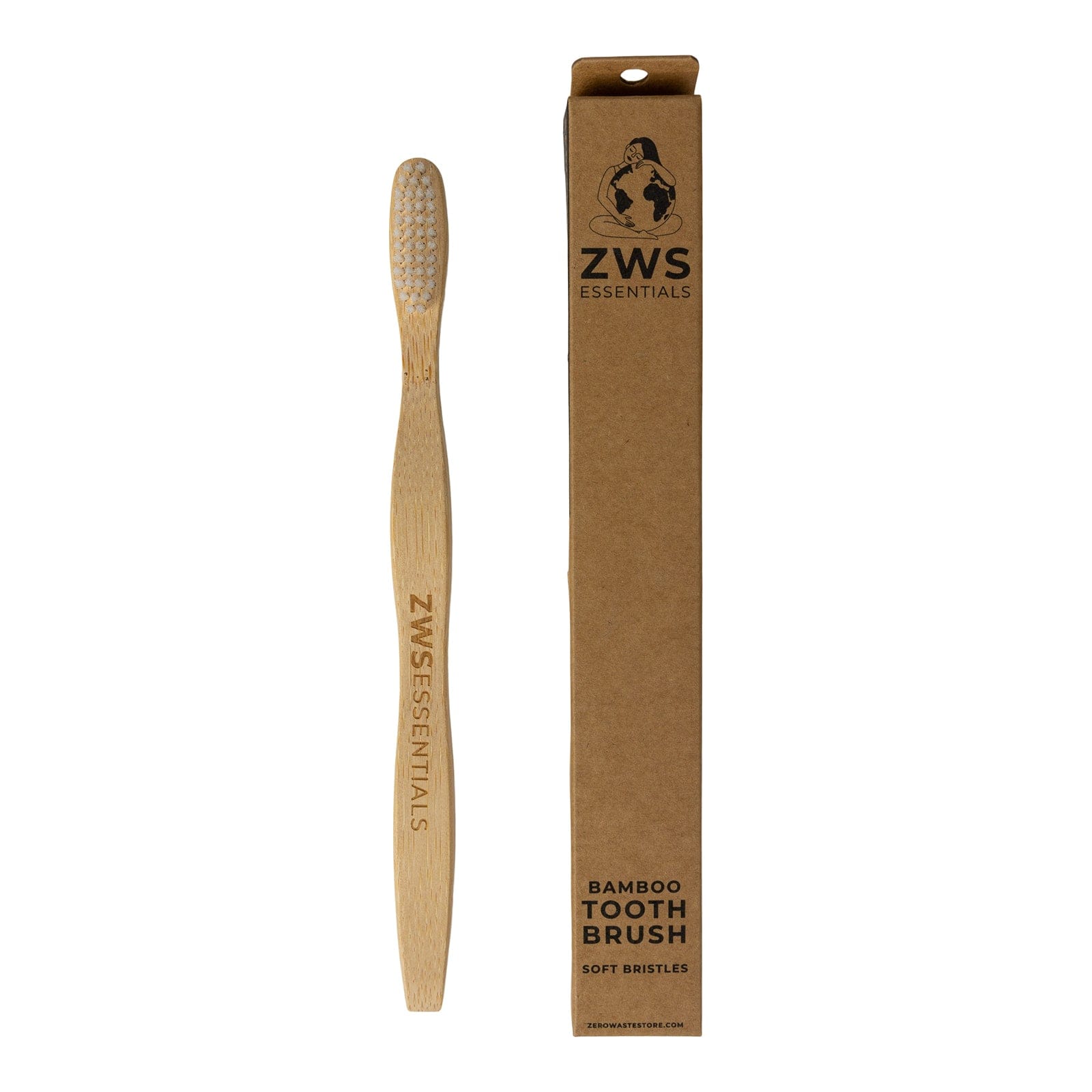 A plastic-free, zero waste Bamboo Toothbrush with soft bristles from ZeroWasteStore.com rests beside its upright brown cardboard box labeled Bamboo Toothbrush Soft Bristles.