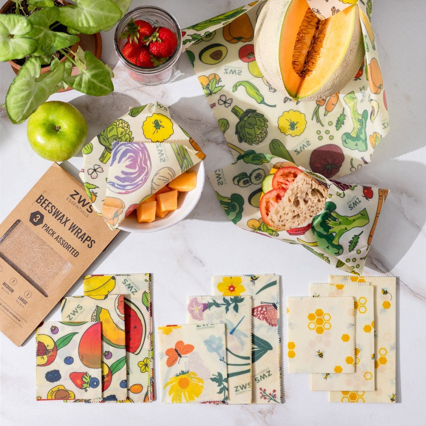Beeswax wraps by ZeroWasteStore.com for plastic-free food storage, featuring colorful reusable food wraps on a white background.