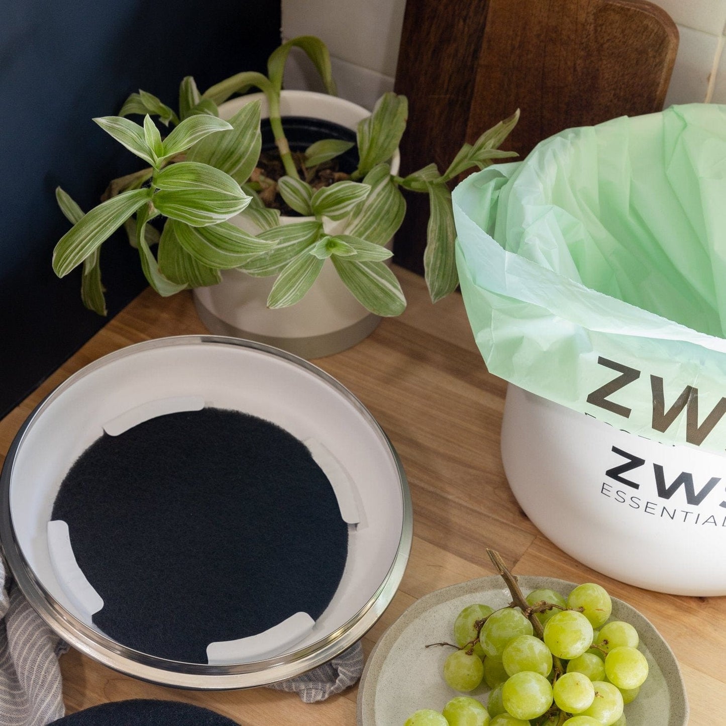ZeroWasteStore.com countertop compost bin kit with stainless steel lid and charcoal filter for kitchen composting.